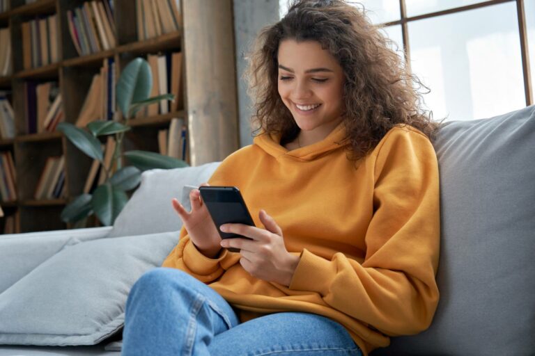 Young woman scheduling her home inspection online